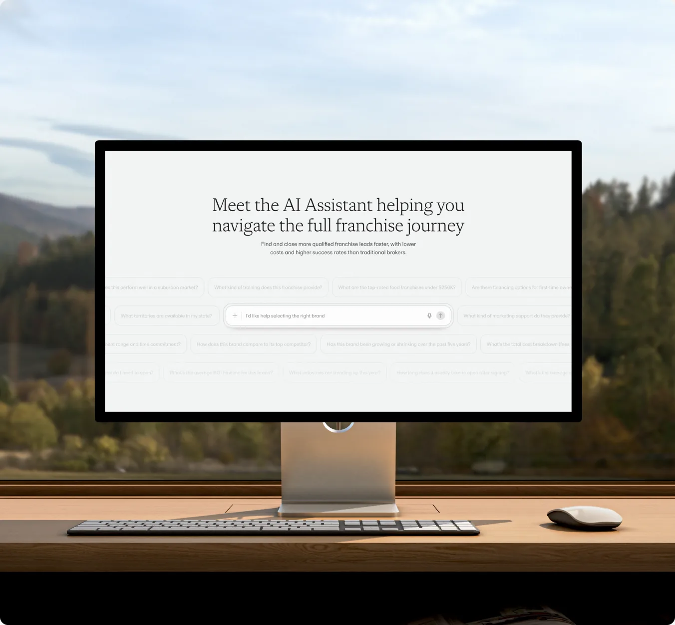 A desktop display on a wooden desk showing glidepath.com — “Meet the AI Assistant helping you navigate the full franchise journey”