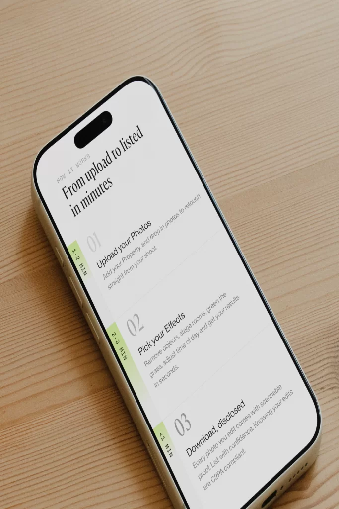 iPhone on a wooden desk showing PropMedia’s “From upload to listed in minutes” steps
