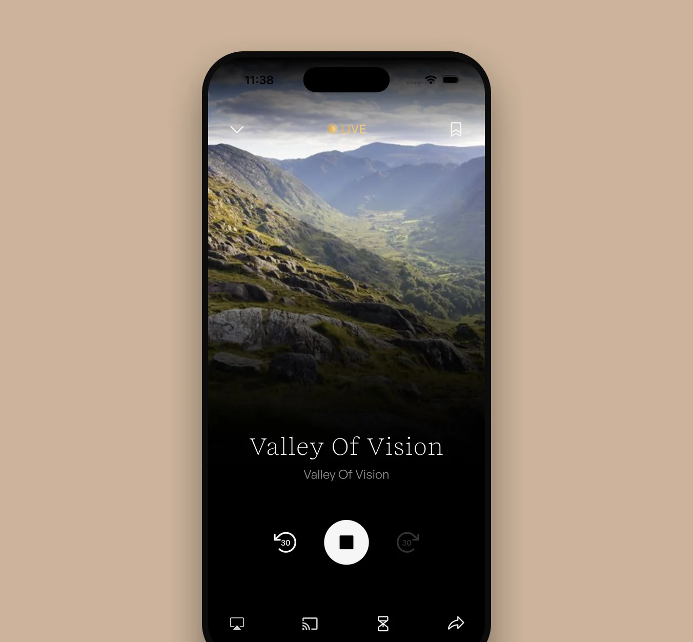 The RefNet iOS full-screen player on a tan card — “Valley Of Vision” over a mountain valley, with skip-back, stop, AirPlay, cast, sleep-timer and share controls